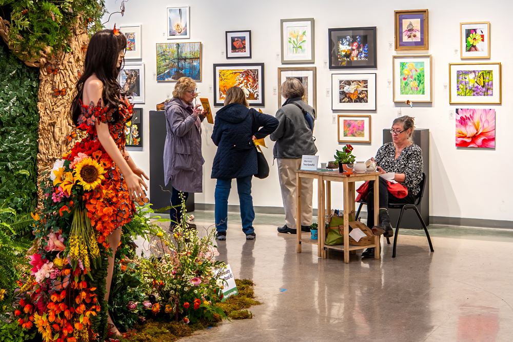 A group of visitors looking at art